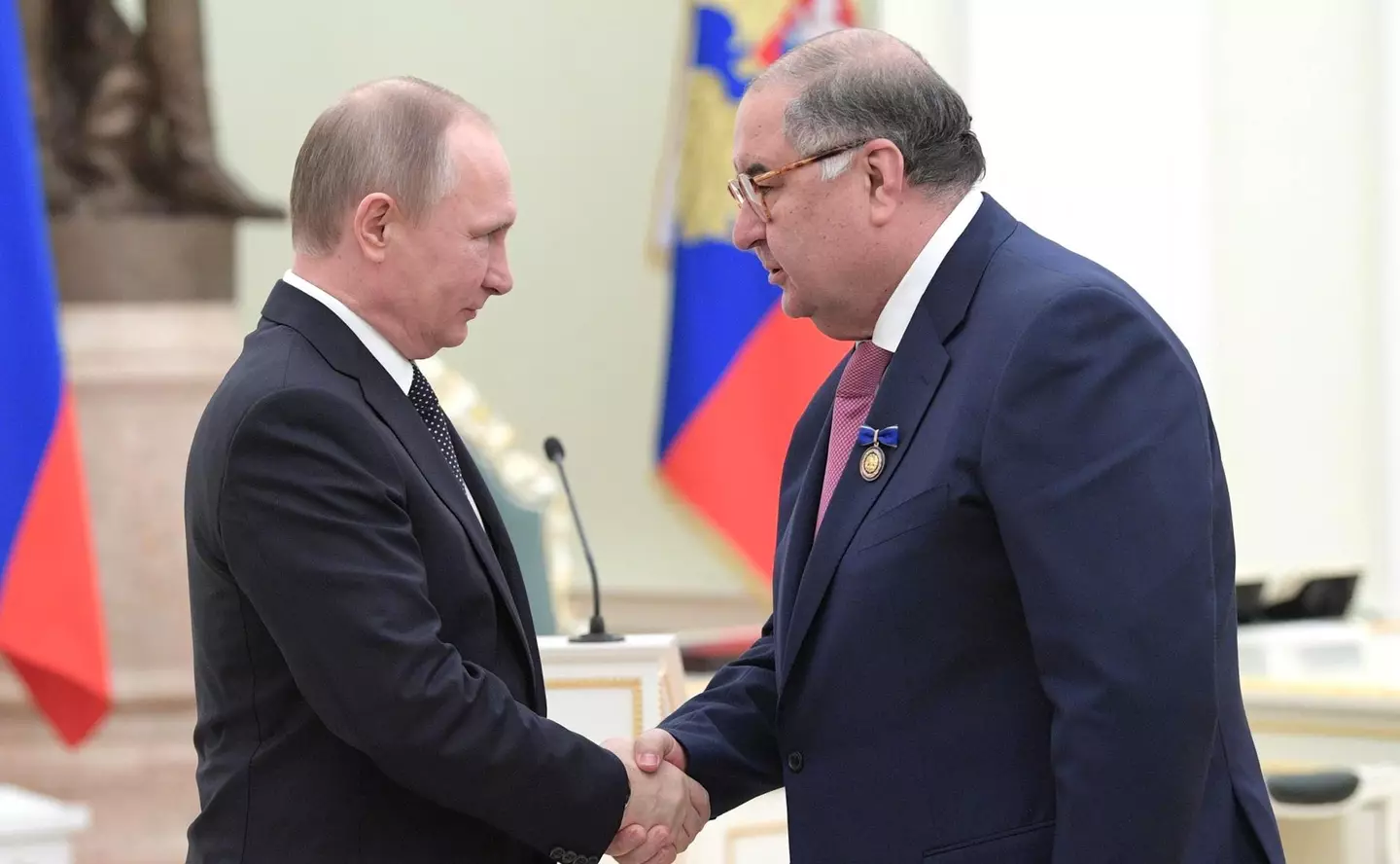 Usmanov (right) was sanctioned by the UK government.