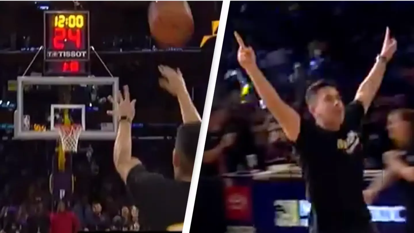 Basketball fan wins $100 000 after scoring unbelievable half court shot Basketball fan wins $100 000 after scoring unbelievable half court shot