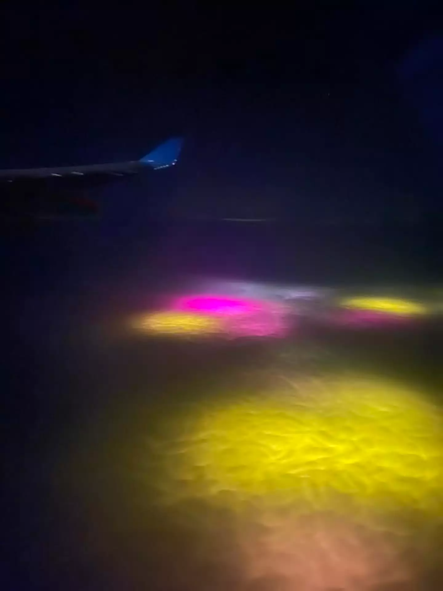Strange yellow and purple lights were seen while they were flying over the Atlantic Ocean (Facebook/Rohan Goonewardena)