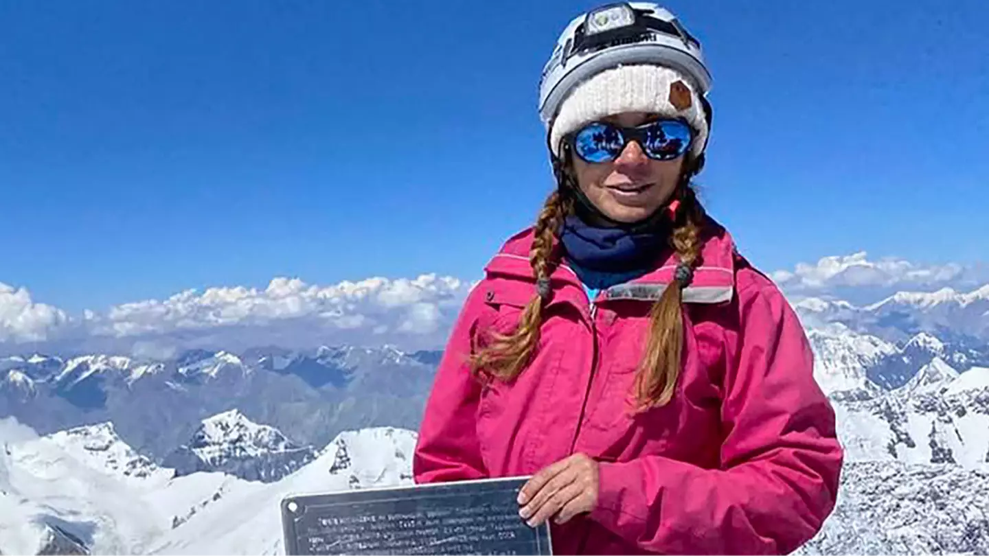 Son of climber 'left to die' after being stranded on mountain makes desperate plea as he claims she's 'still alive'