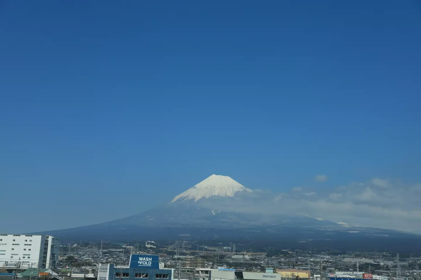 Mount Fuji typically has snow covering the peaks comes October (Aytug Can Sencar/Anadolu via Getty Images)