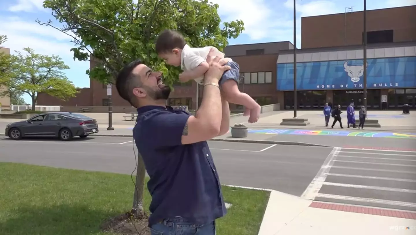 The University graduate promised his son they'd pick up his diploma together (WGRZ-TV/YouTube)