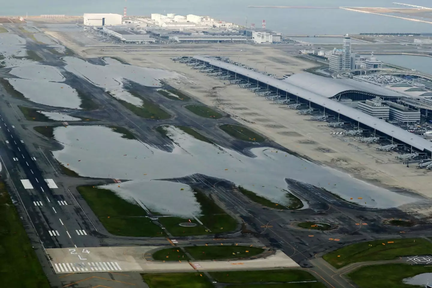 Flooding of Kansai International Airport after Typhoon Jebi hit Japan's west coast in 2018 (JIJI PRESS/JIJI PRESS/AFP via Getty Images)