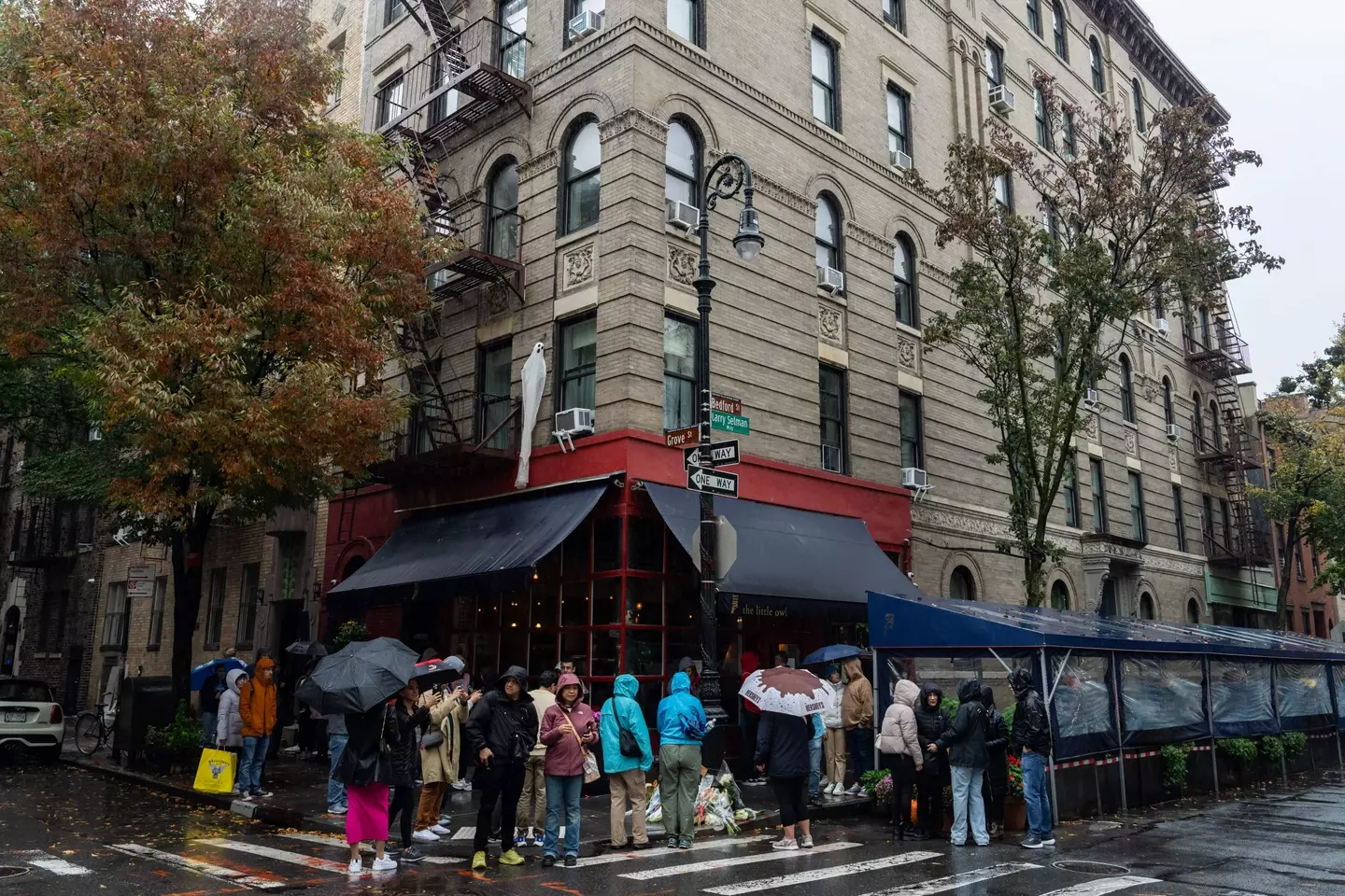 Many well-wishers flocked to Manhattan’s West Village to the apartment building at 90 Bedford Street.