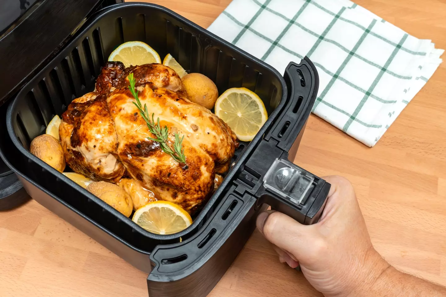 Air Fryers are hailed as one of the most cost-effective ways to cook. (Rafa Jodar/Getty Stock)