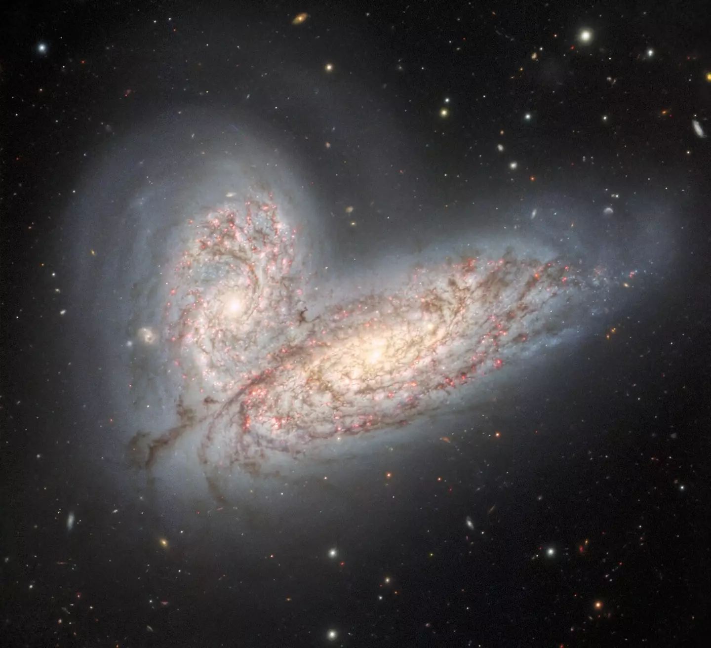 This image was captured last year and shows two spiral galaxies -  NGC 4568 and NGC 4567 - crashing into each other.