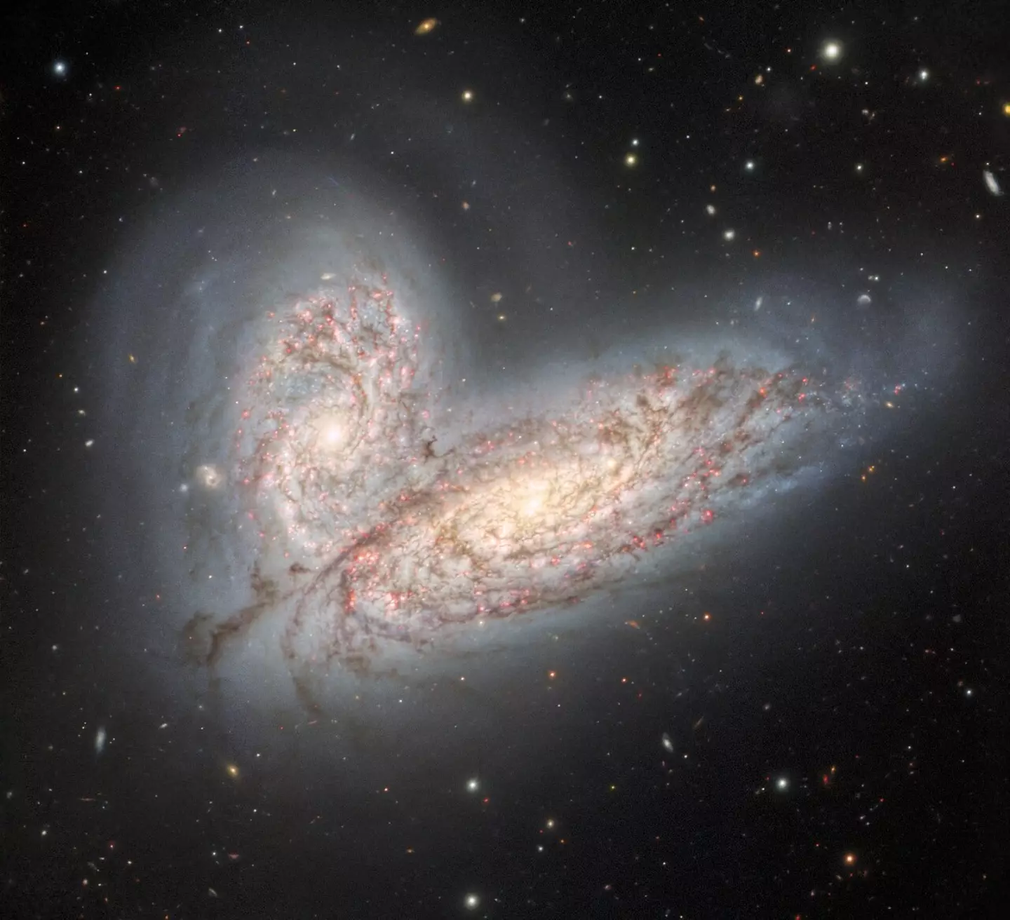 This image was captured last year and shows two spiral galaxies - NGC 4568 and NGC 4567 - crashing into each other.