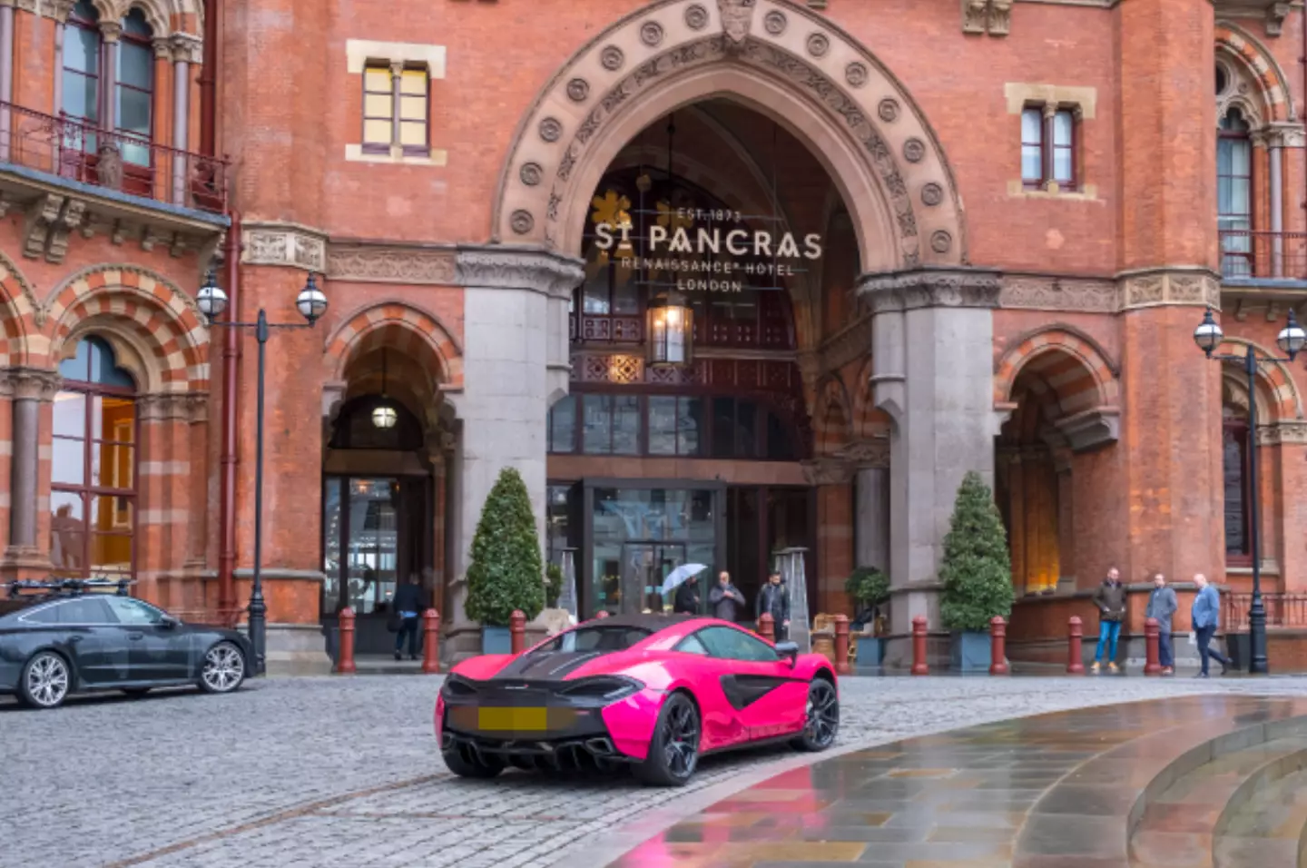 People have been puzzled why the flashy car is posted up out front. (Andrew Aitchison / In pictures via Getty Images)