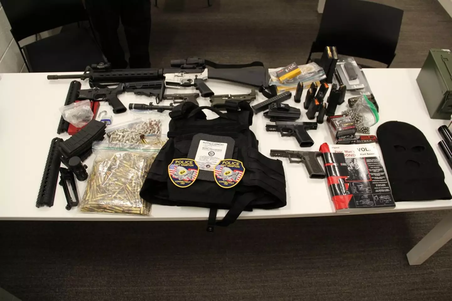 Police found both guns and ammunition at the property.