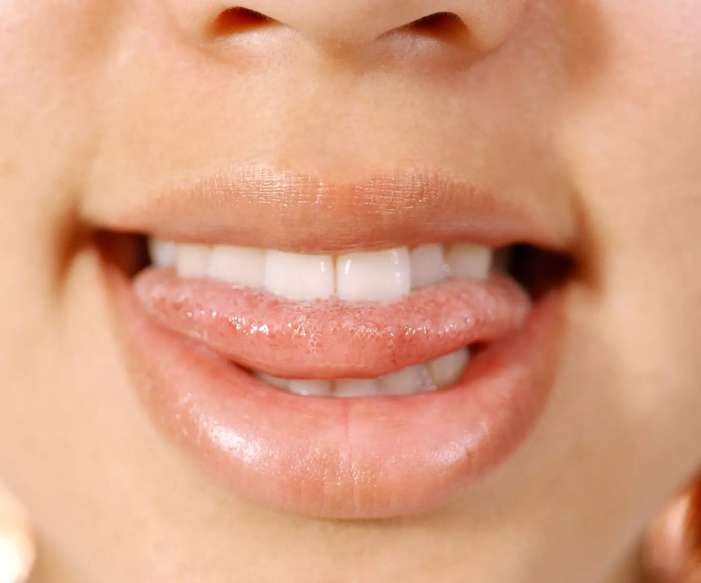 Gleeking is a bizarre trend that involves your tongue (Getty stock)