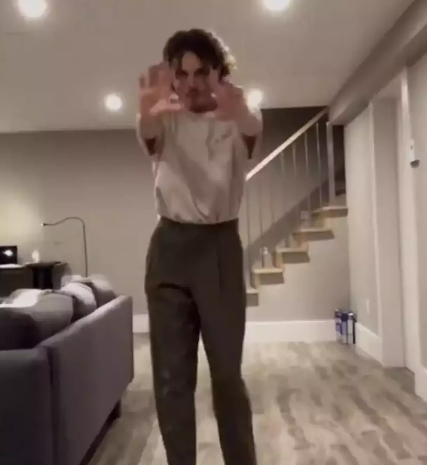 People have spotted a terrifying figure in a video of a TikTok dancer who was home alone.