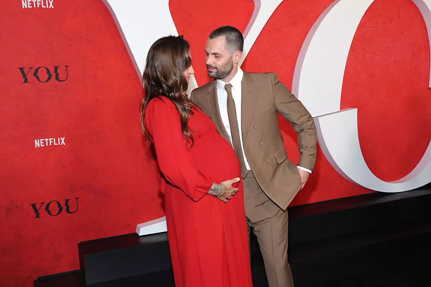 Badgley and his wife, Domino Kirke-Badgley, at the You season 5 premiere in New York (Michael Loccisano/WireImage)