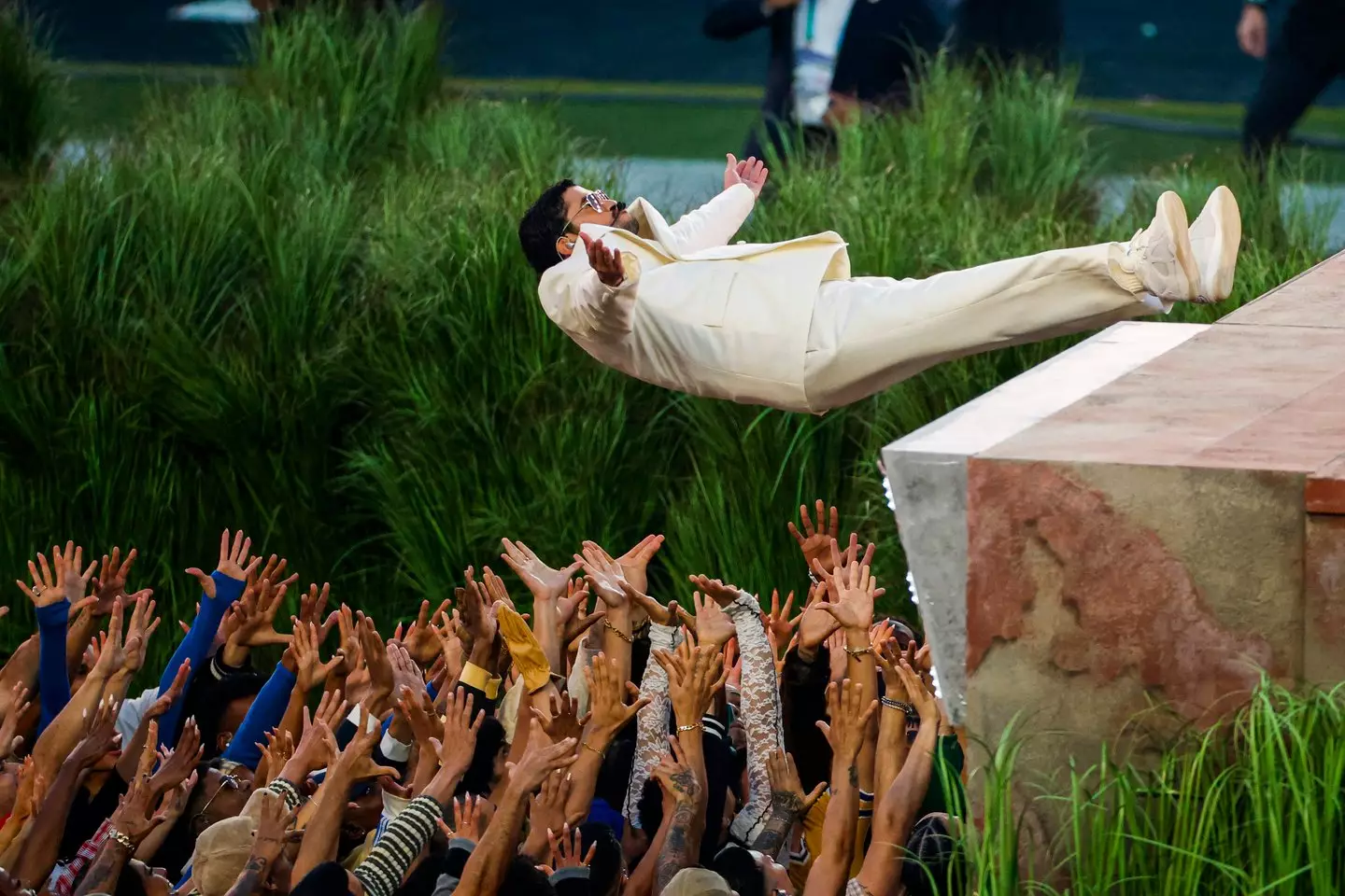 Bad Bunny's set was filled with symbolism, including a moment where he gave one of his Grammys to a young boy (Stephen Lam/San Francisco Chronicle via Getty Images)