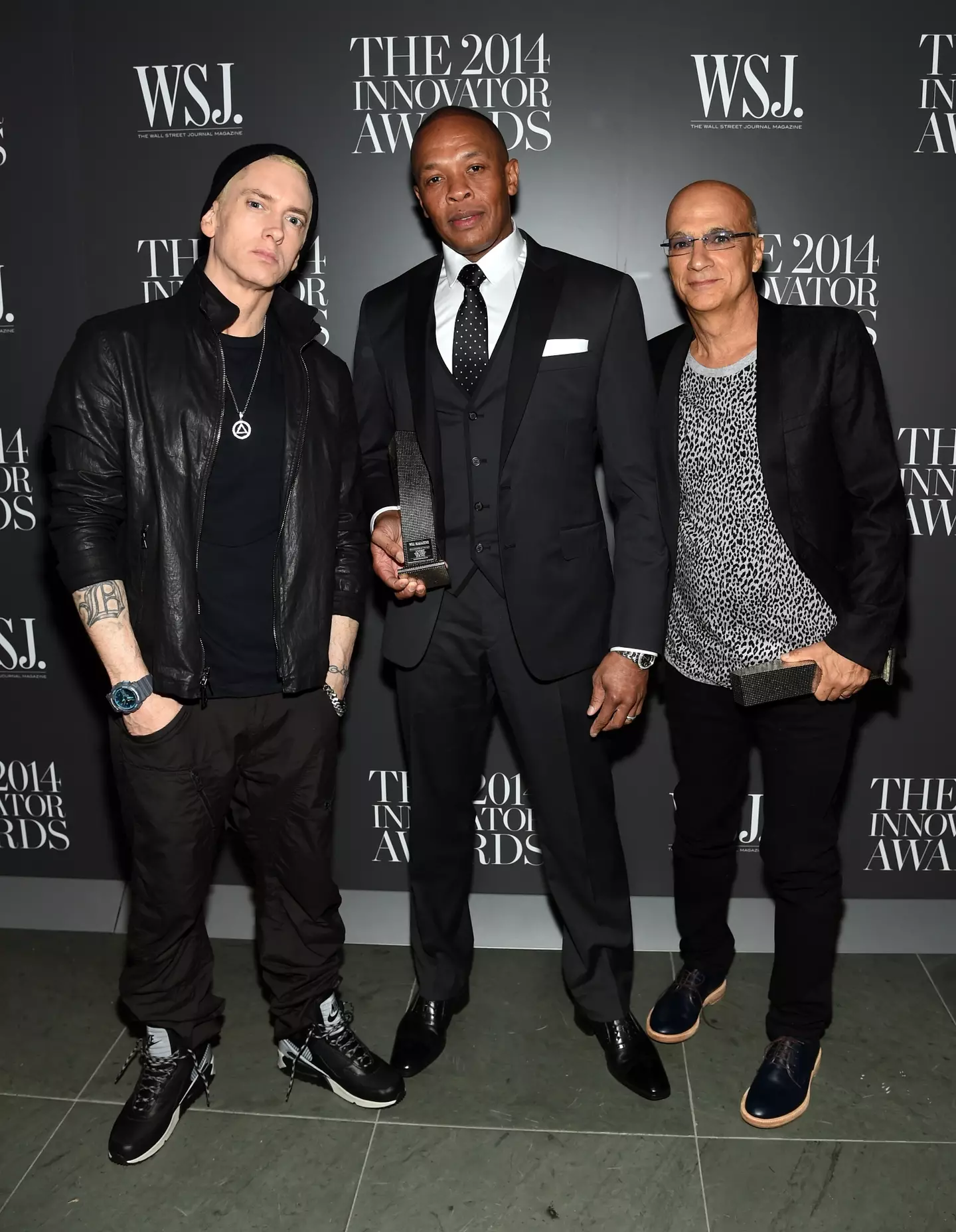 The rapper pictured with Dr. Dre and Jimmy Iovine in 2014.