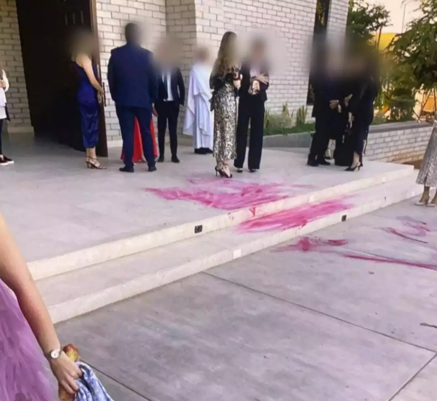 There was red paint all over the church steps.
