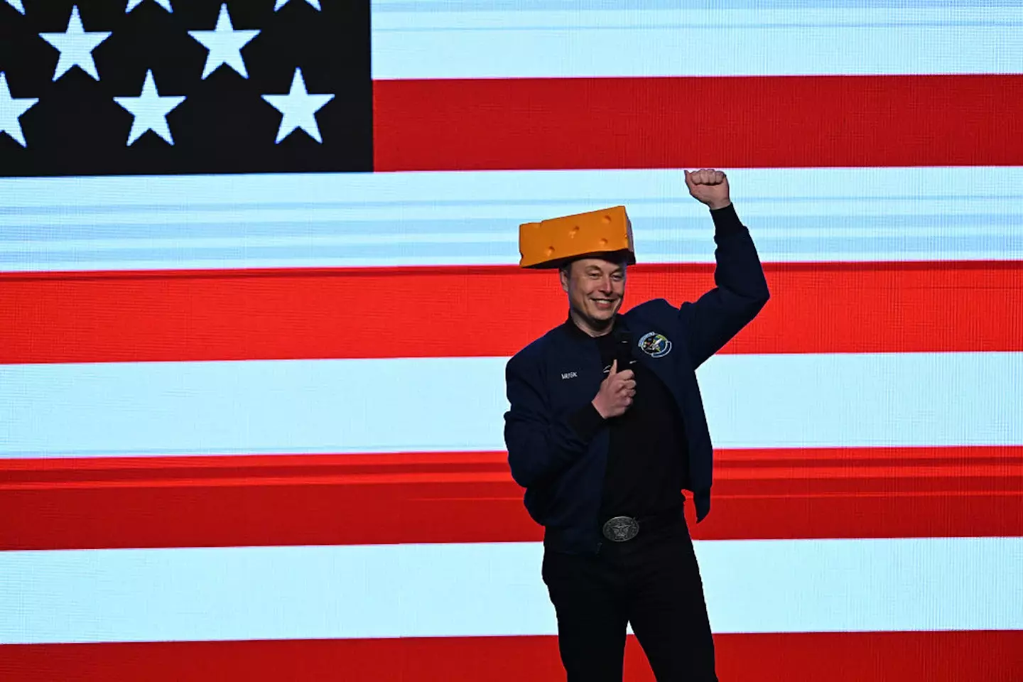 Elon Musk arrived at the rally with cheese on his head (Joshua Lott/The Washington Post via Getty Images)