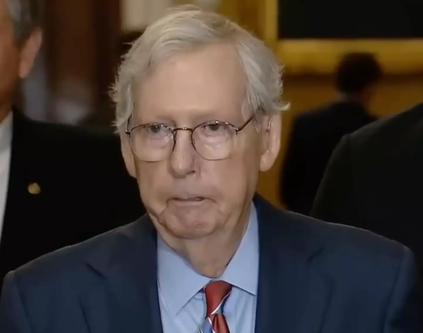 McConnell returned to the lectern after being led away.