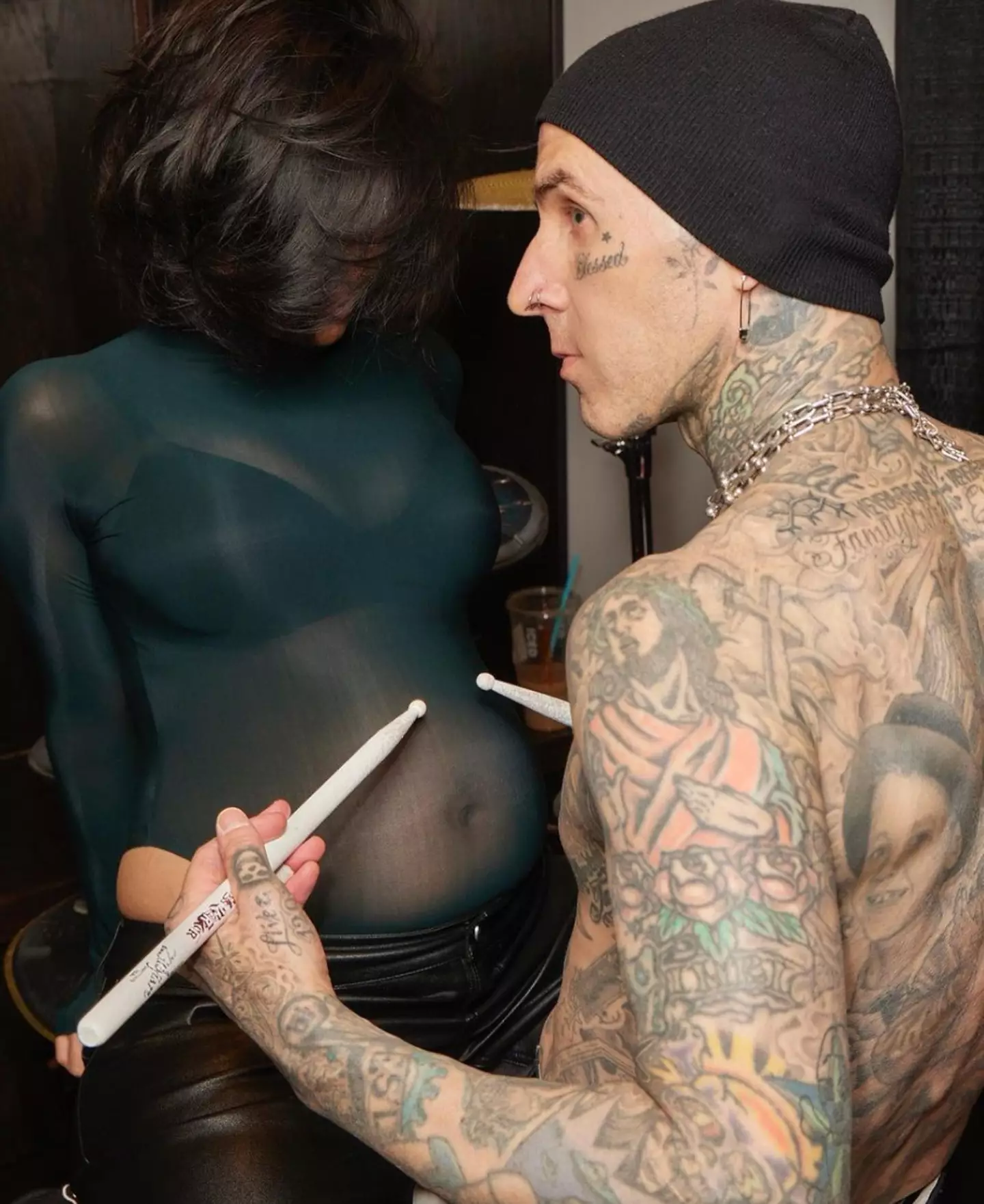 Kourtney announced her pregnancy at one of Travis' Blink 182 concerts.