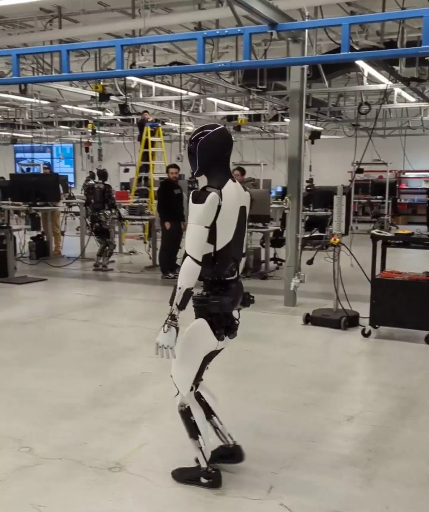 Optimus can now walk.