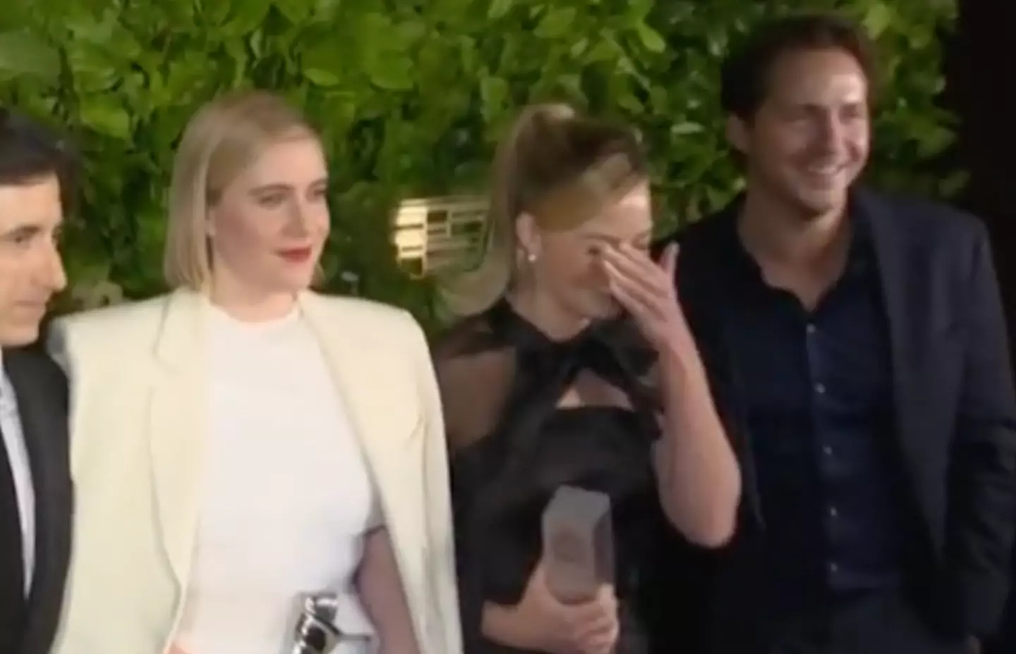 The pair can be seen giggling away.