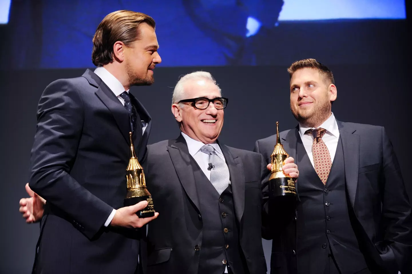 Jonah Hill alongside Wolf of Wall Street co-star Leonardo DiCaprio and director Martin Scorsese.