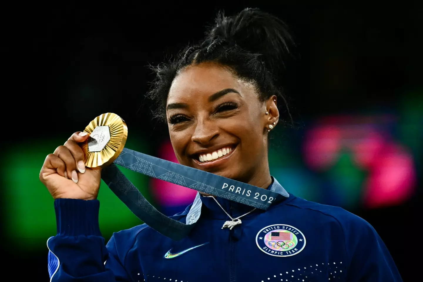 Olympians like Simone Biles will be paid $38,000 reward for winning gold. (LOIC VENANCE/AFP via Getty Images)