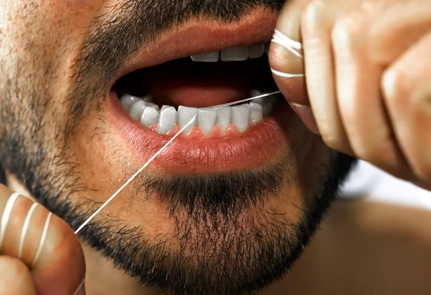 Flossing could have more benefits than we realize... (Daniel Day/Getty Images)
