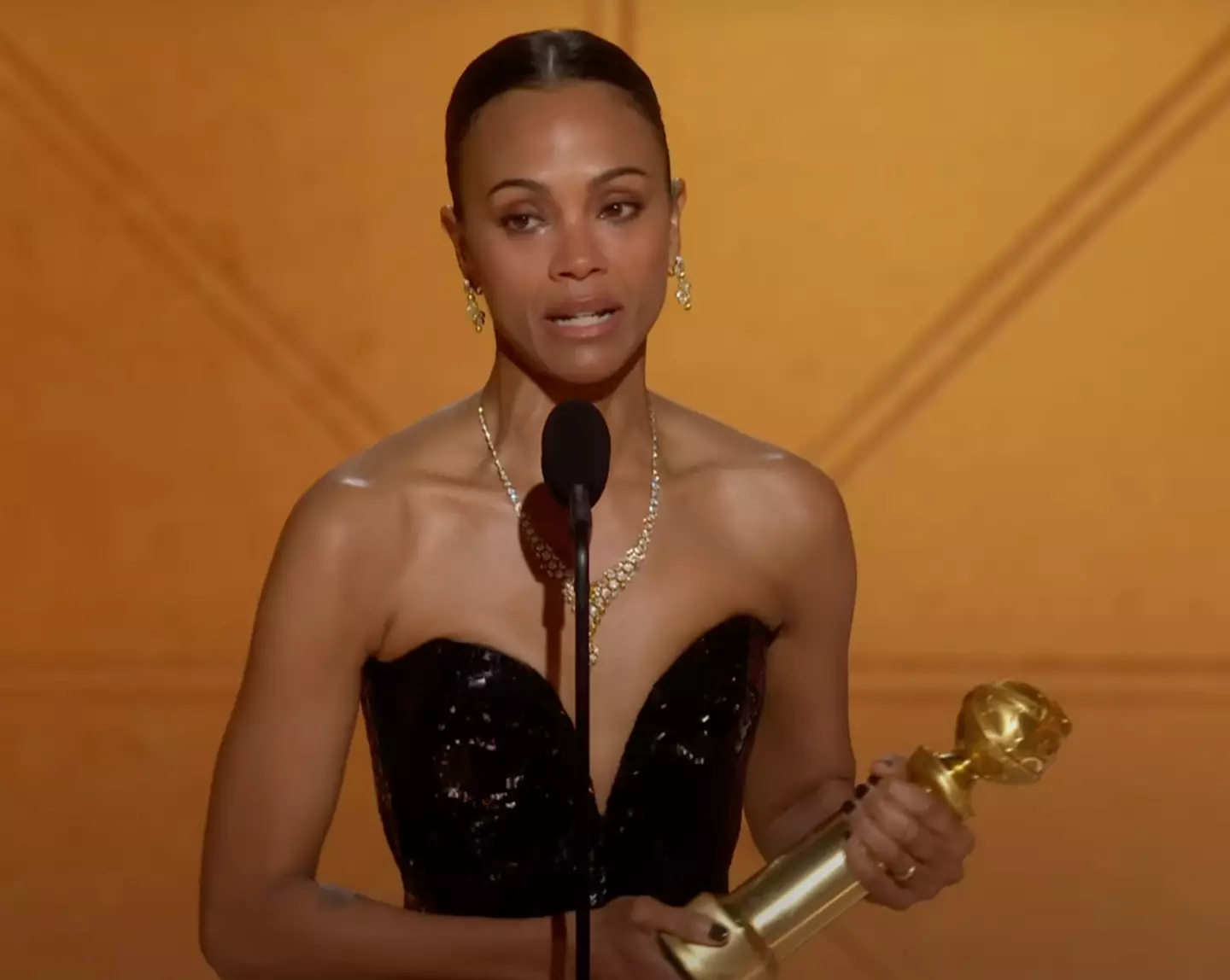 Saldaña won her Golden Globe for best actress for her role as Rita in Emilia Pérez (CBS News)