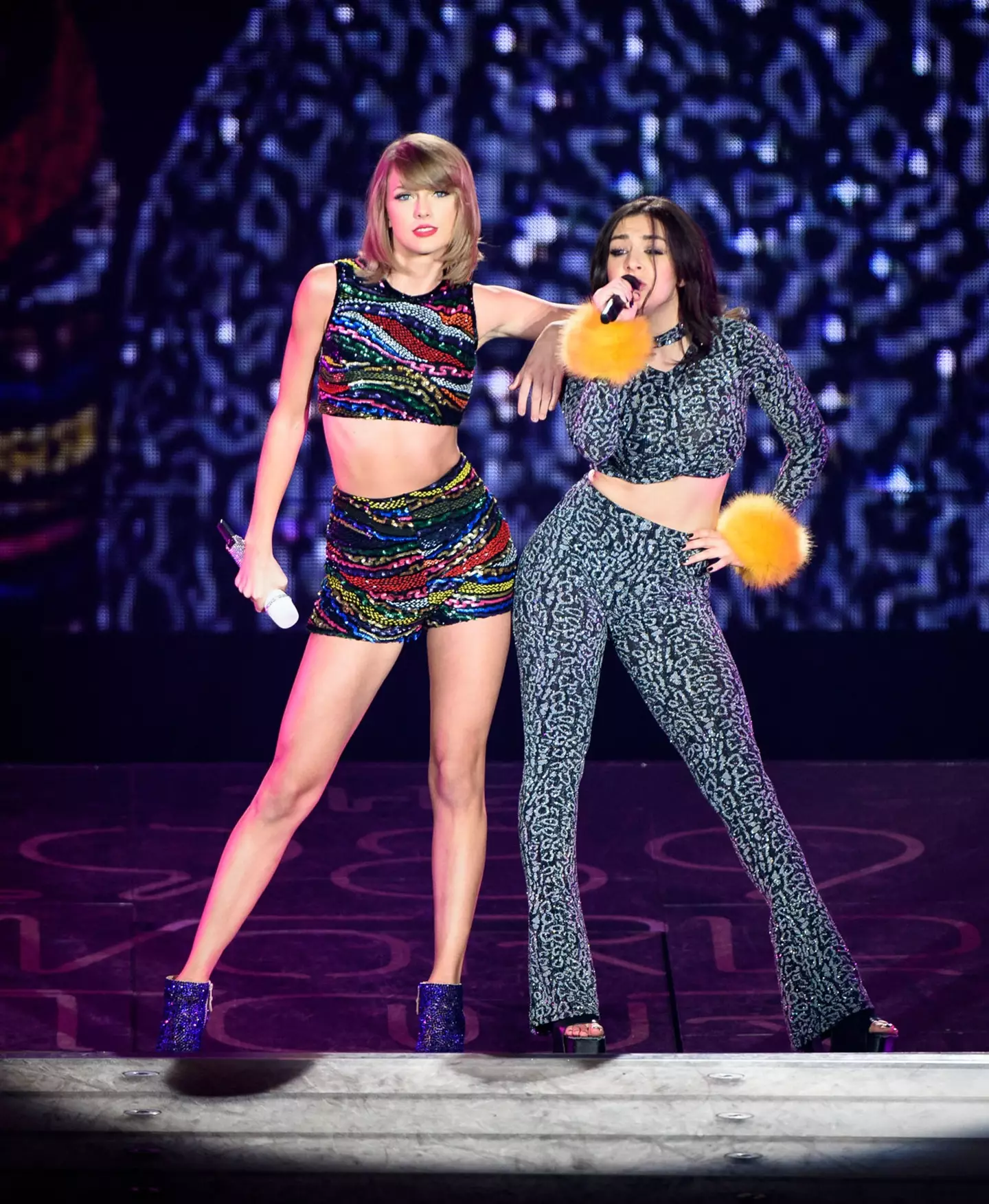Taylor Swift and Charli XCX seen performing together in 2015. (George Pimentel/LP5/Getty Images for TAS)