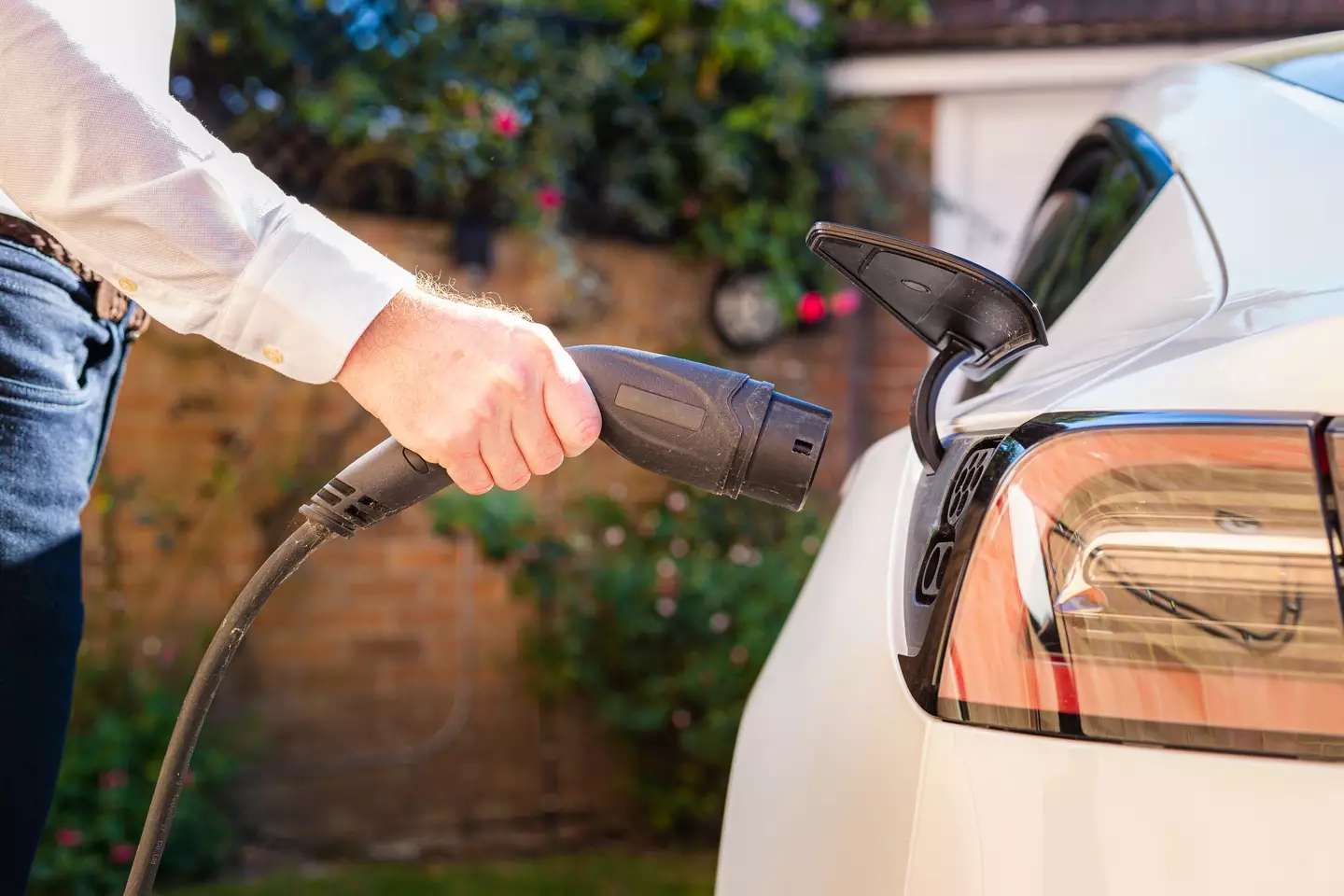 If you're charging your Tesla at home, expect to fork out more on your electric bill (Getty stock)