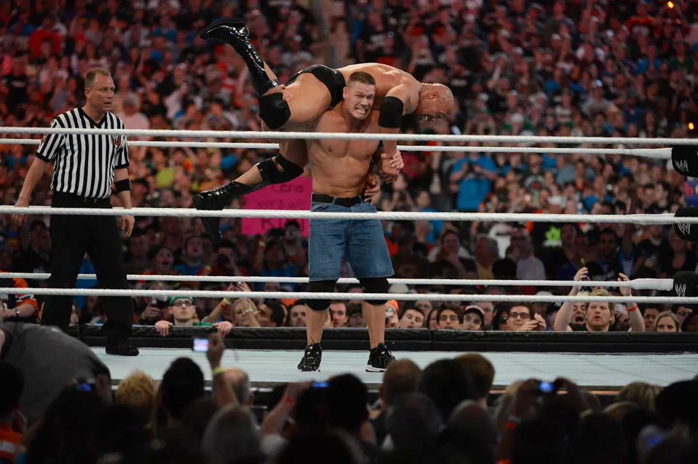 John Cena and The Rock in action in the WrestleManiaXXVIII in 2012.