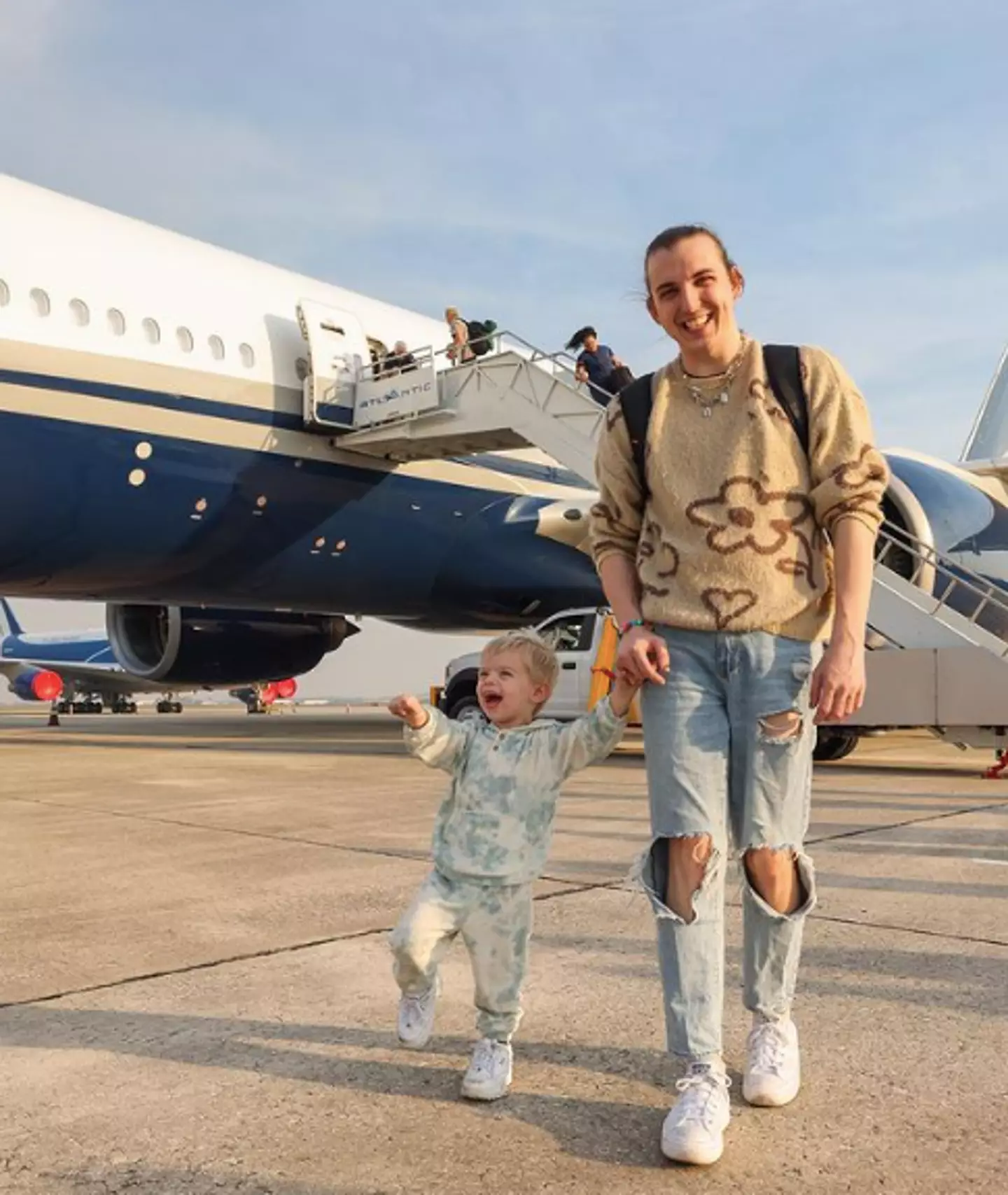 Chris Tyson with their son Tucker.