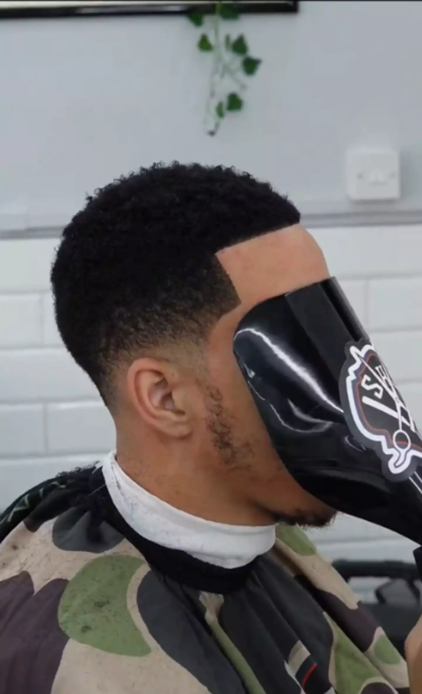 Devin Booker was forced to deny claims he wearing a wig. X/@mymixtapez