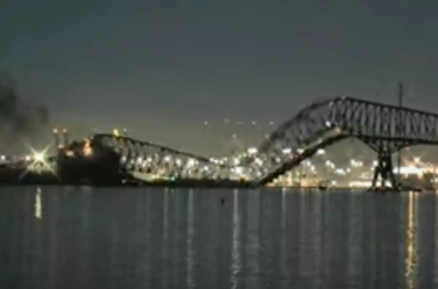 The bridge collapsed after being hit by the cargo ship.