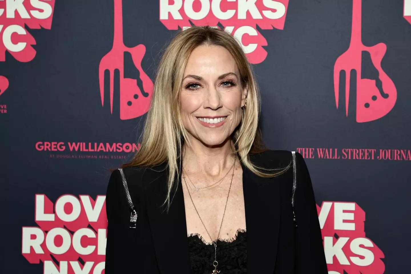 Sheryl Crow has hit back saying she was from a small town and accused the song of 'promoting violence'.
