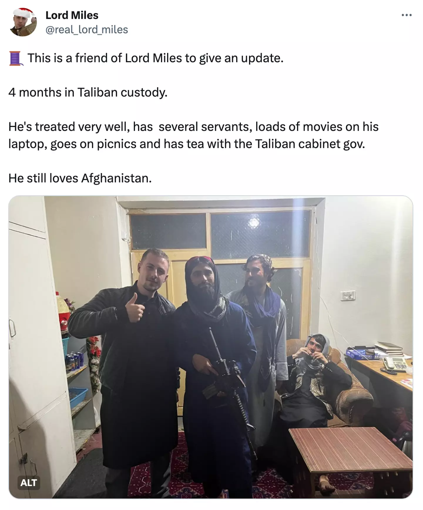 The Twitter post showing Miles Routledge posing with the Taliban.