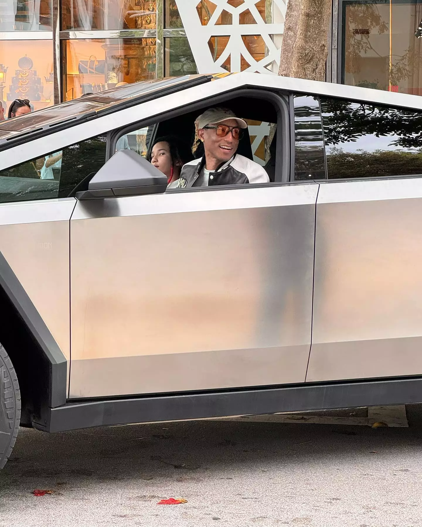 Pharrell Williams was spotted driving his new Tesla Cybertruck.