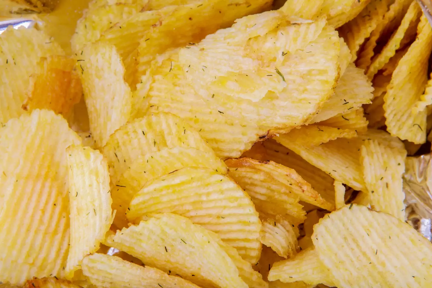 Potato chips are full of 'empty calories', according to cardiologist Lauren Baldwin (Getty stock)