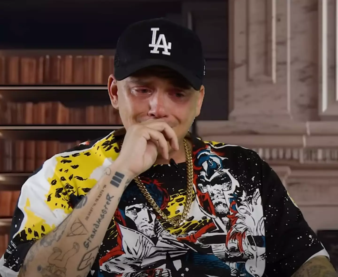 The rapper repeatedly had to pause to wipe away the tears from his eyes, also asking his father not to interrupt at all.