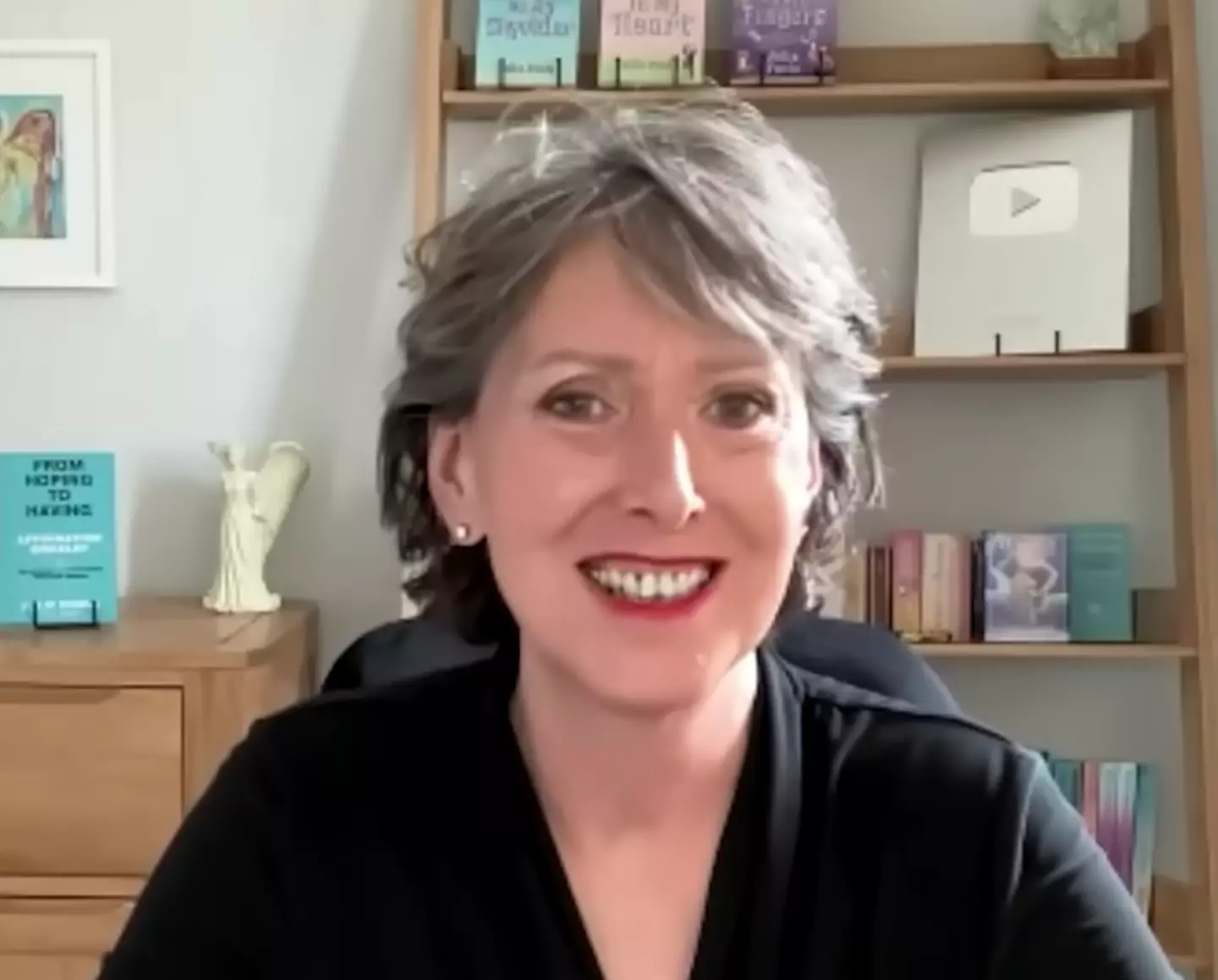 Poole has made a career out of spiritual connection. (YouTube/Life After Death NDE)