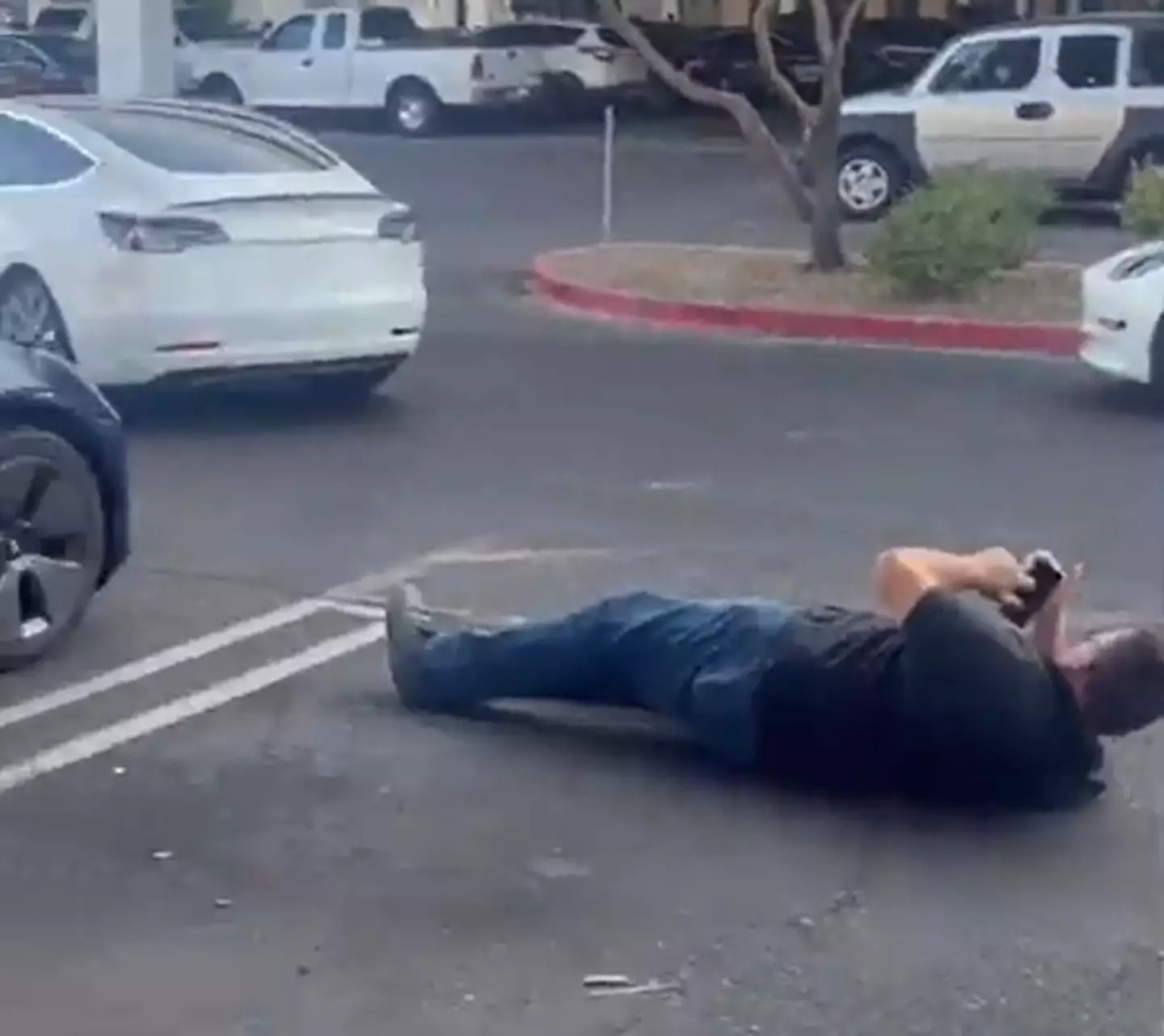 He stayed in the spot for 15 minutes until people helped him get his car on charge.