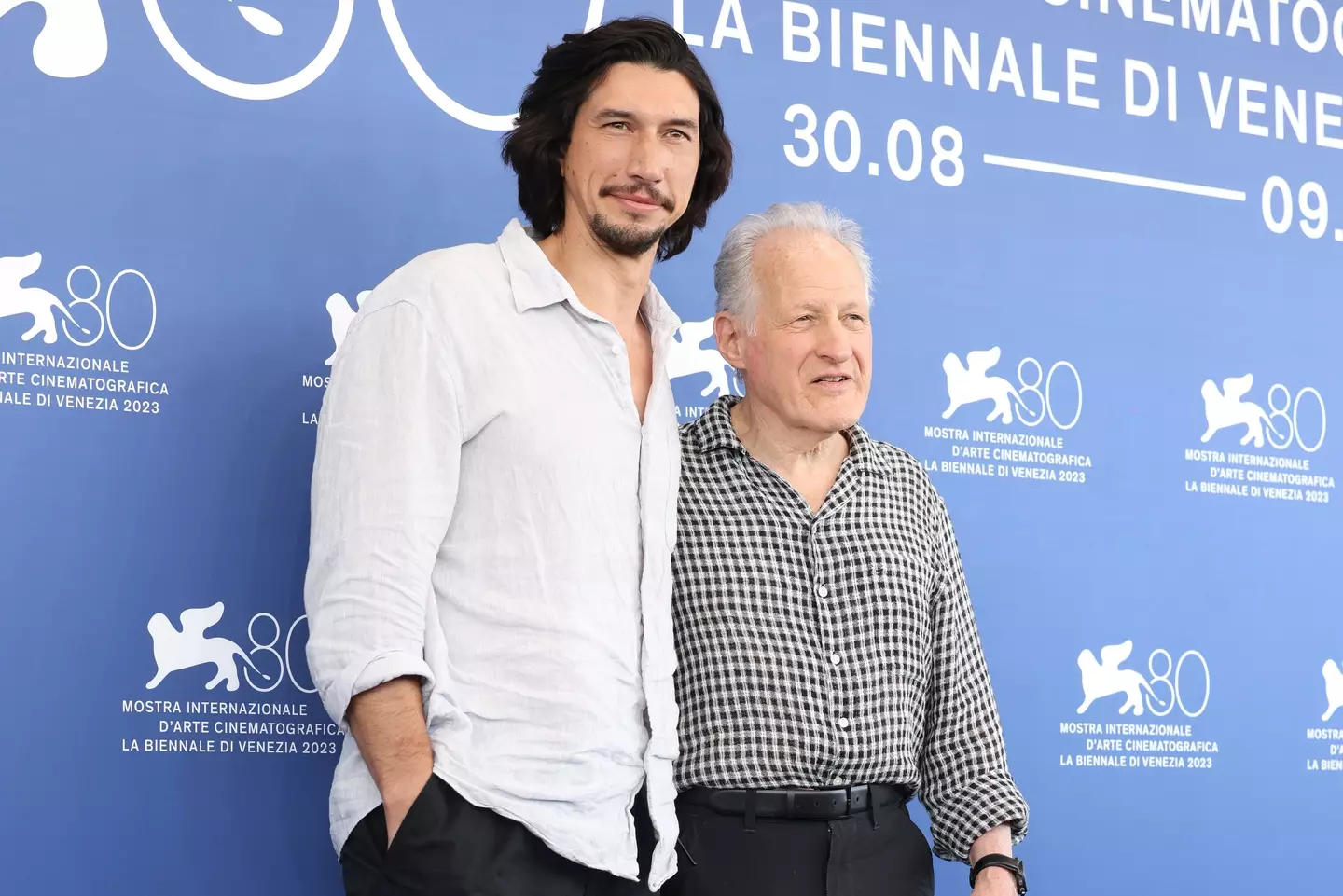 Adam Driver and director Michael Mann attend a photocall for the movie 'Ferrari'.