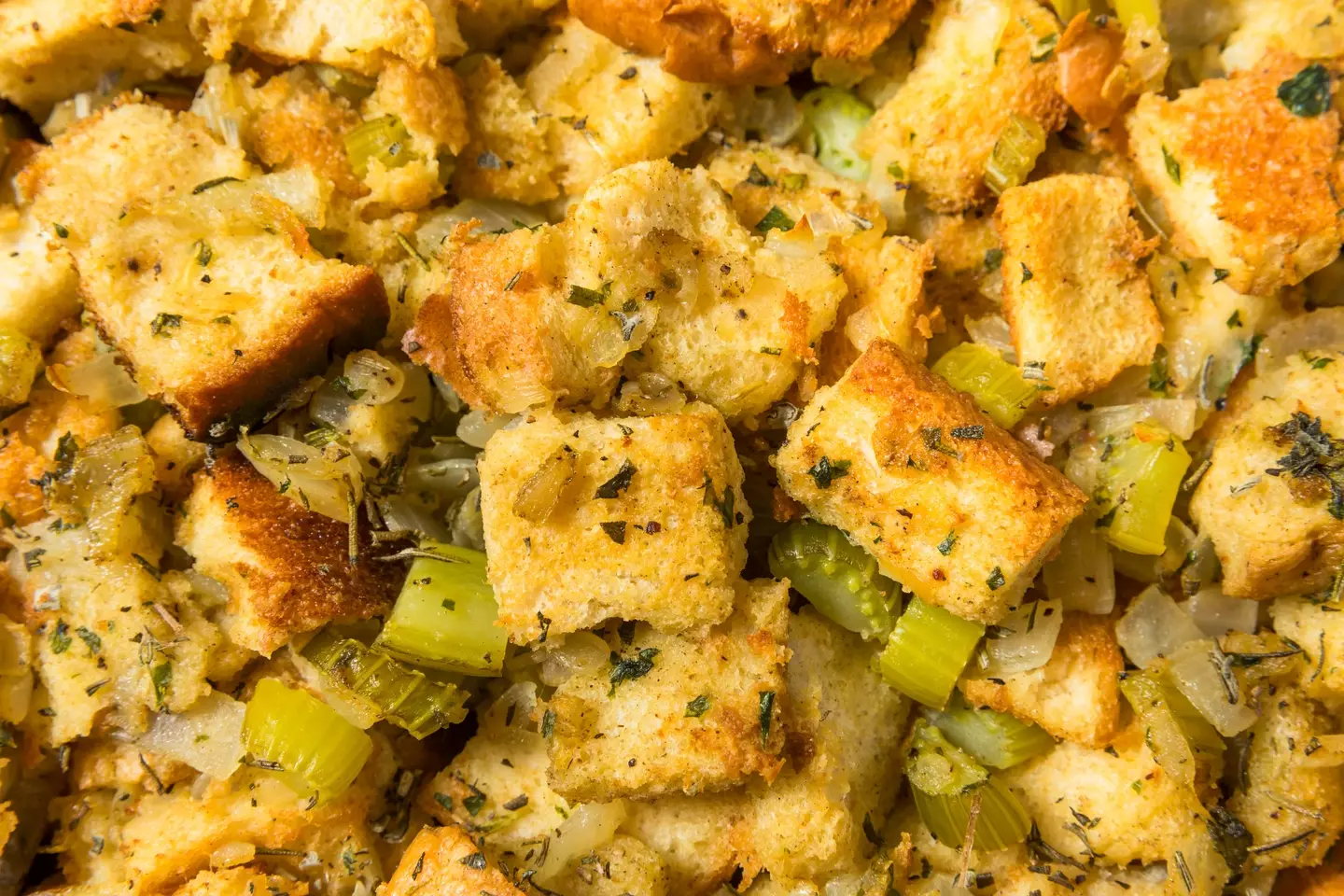 Stop ruining your Thanksgiving turkey by putting stuffing inside of it (bhofack2/ Getty Stock)