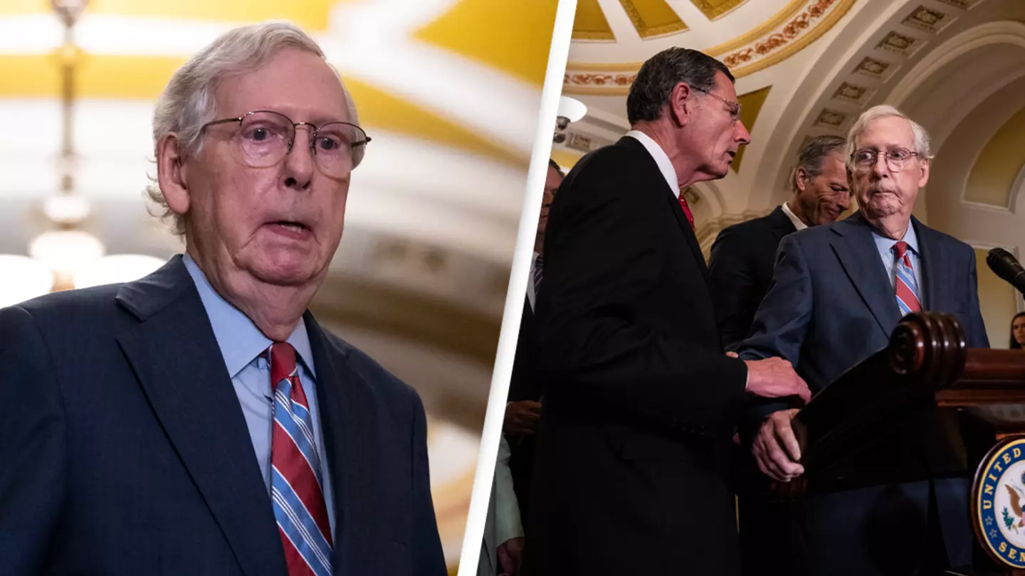 Republican Mitch McConnell gets escorted away after freezing during press conference