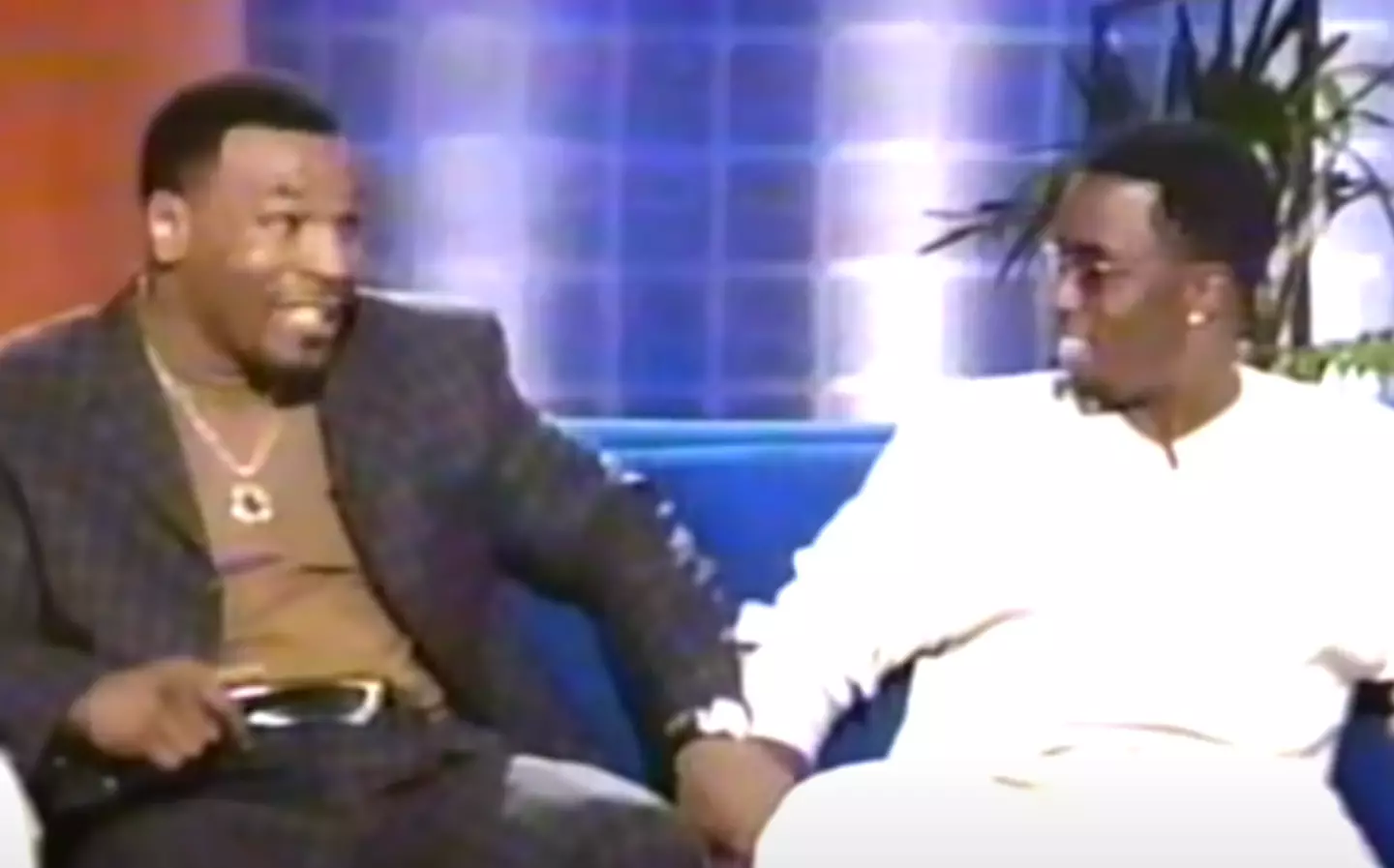 He can be seen lifting Diddy's hand (Syndication/ The Keenan Ivory Wayans Show)