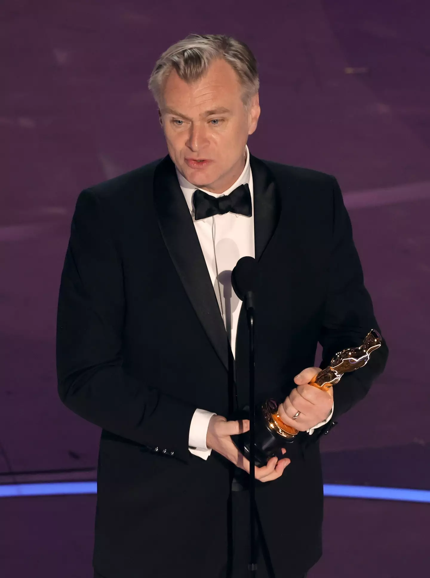 Nolan accepts Best Director.