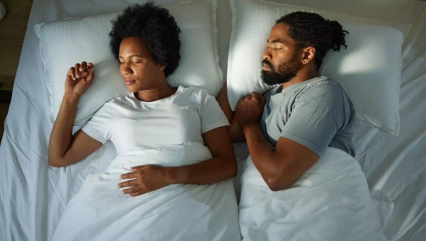 Limiting cell phone use and going to bed earlier could help stop you from waking up (Getty Stock Image)