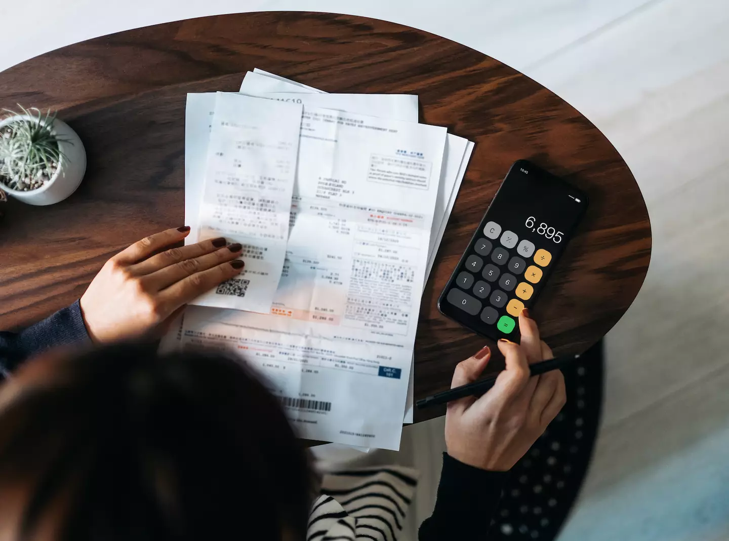 Bruining explained the costs are often laid out in long contracts. (Getty Stock Image)