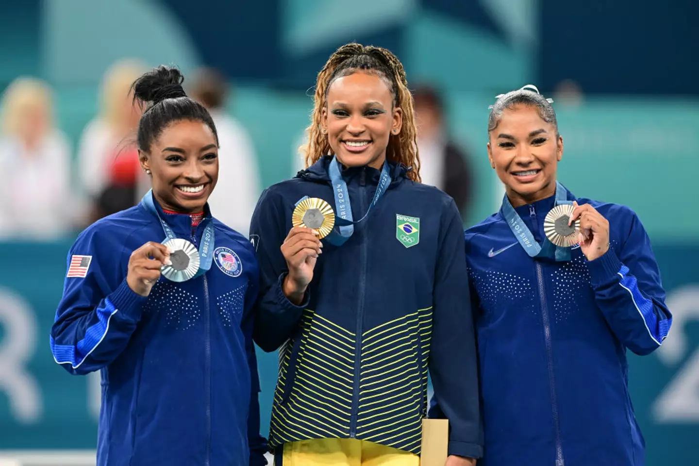Silver medallist Simone Biles, gold medallist Rebeca Andrade, and Jordan Chiles - who was eventually forced to give up her bronze medal (Mehmet Murat Onel/Anadolu via Getty Images)