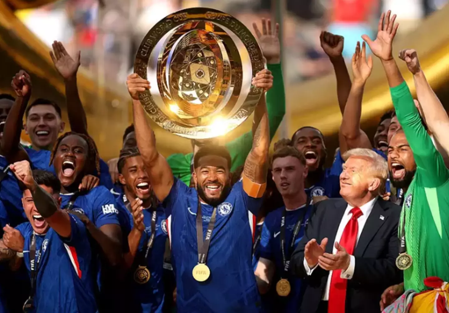 Trump didn't step aside as was expected as the team hoisted the trophy (Carl Recine - FIFA/FIFA via Getty Images)